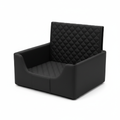 Black quilted dog car seat booster on white background